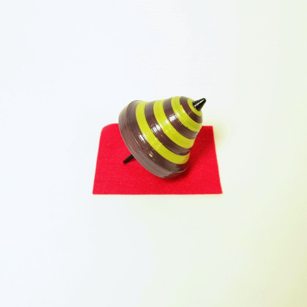 Bell-Shaped Ornamental Spinning Top