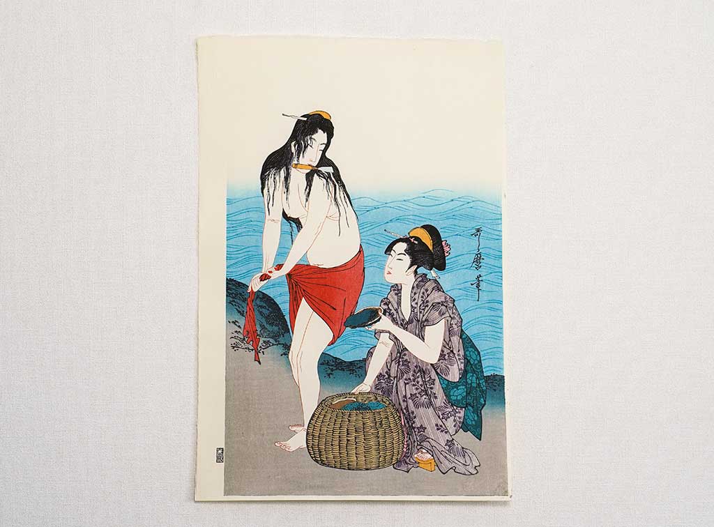 Woodblock print "Harvest abalones" by Utamaro Published by UCHIDA ART